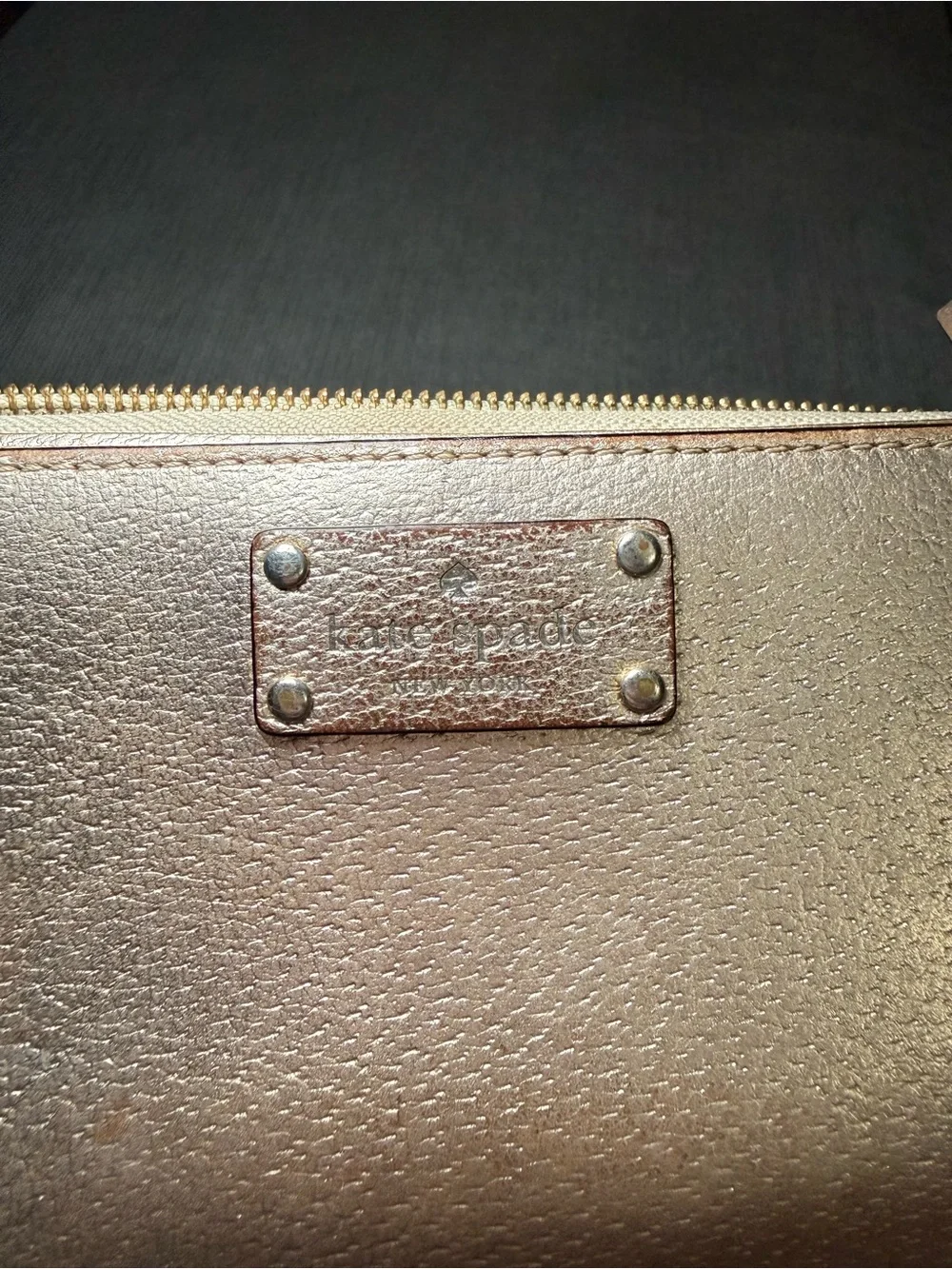 Kate spade Metallic Rose Gold Wristlet Wallet with Zip Closure